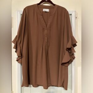 Brown tunic with ruffled sleeves